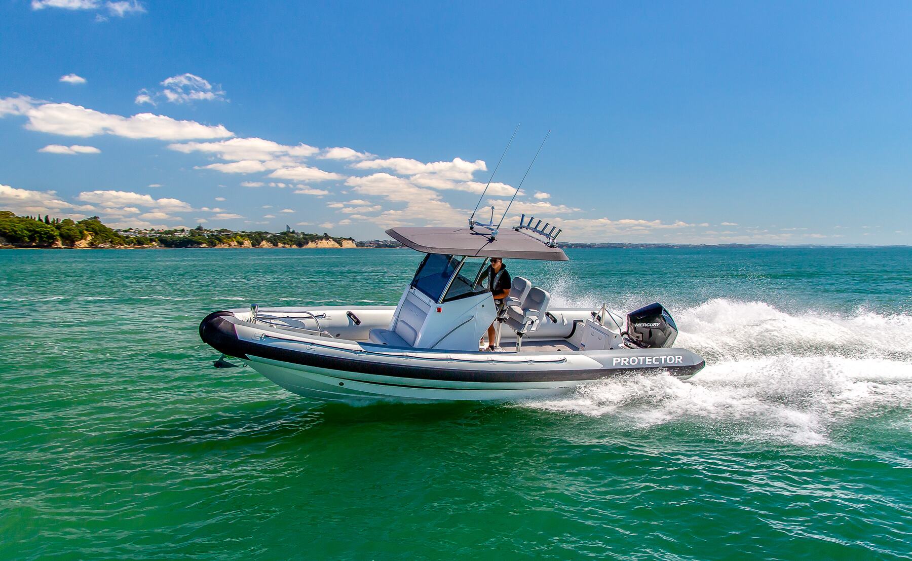 Protector 250 Chase RIB running at speed on open water