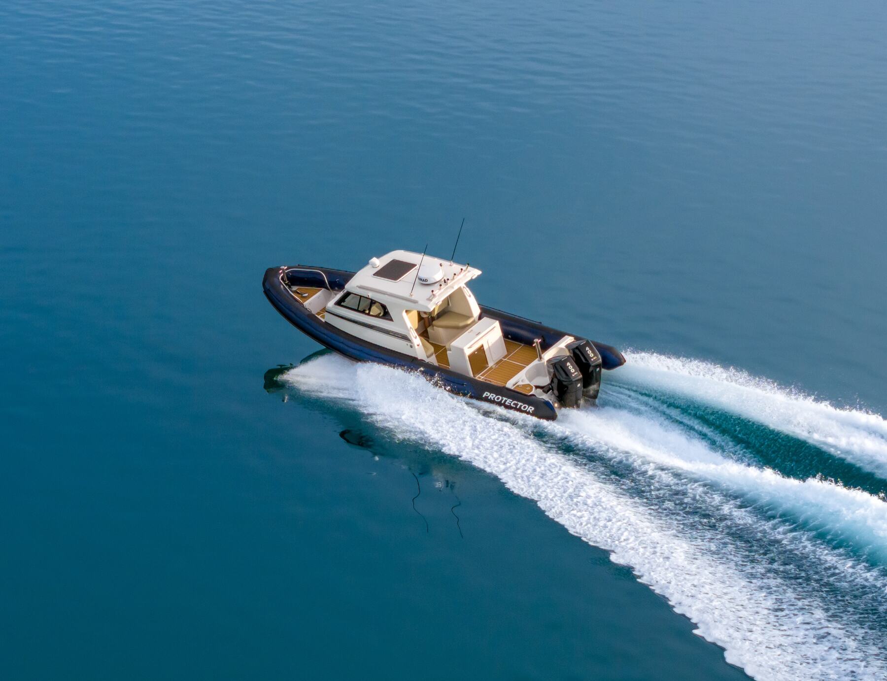 Protector 330 Targa RIB running at speed on open water