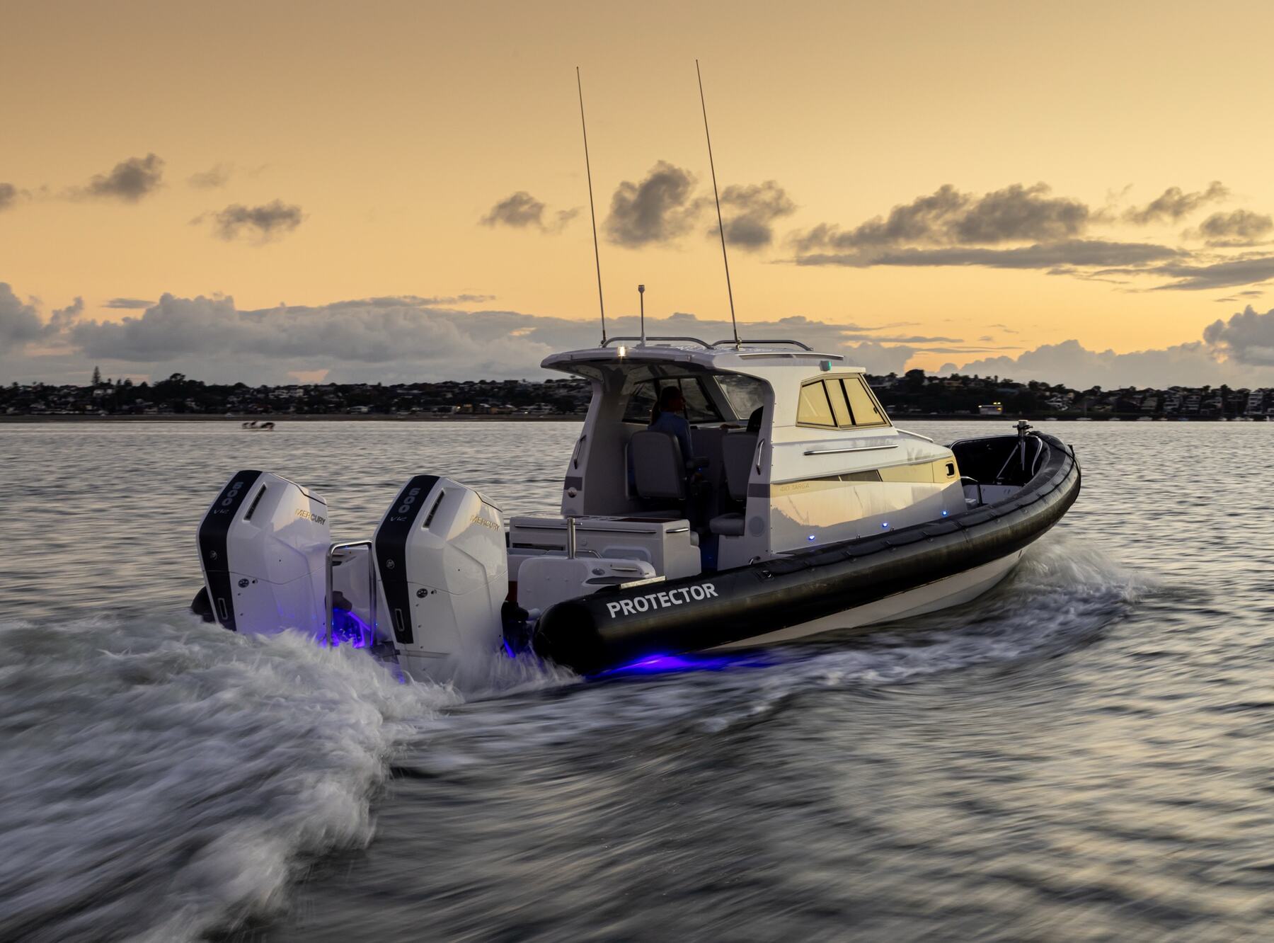 Protector 410 Targa running at speed on open water