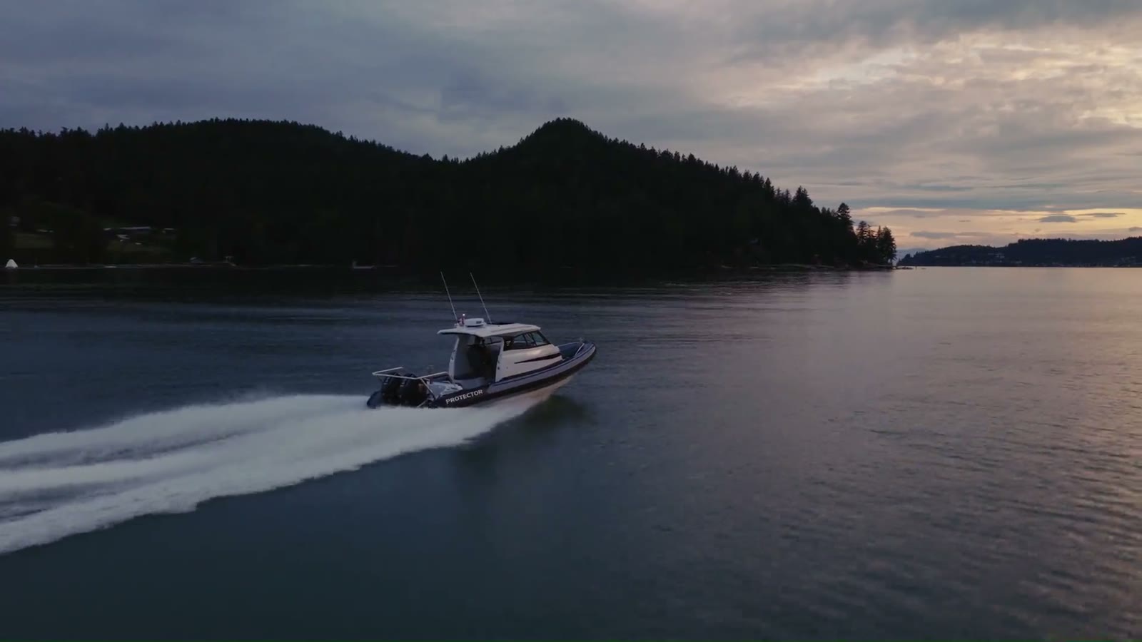 A Protector Targa running through open water off the British Columbia coast
