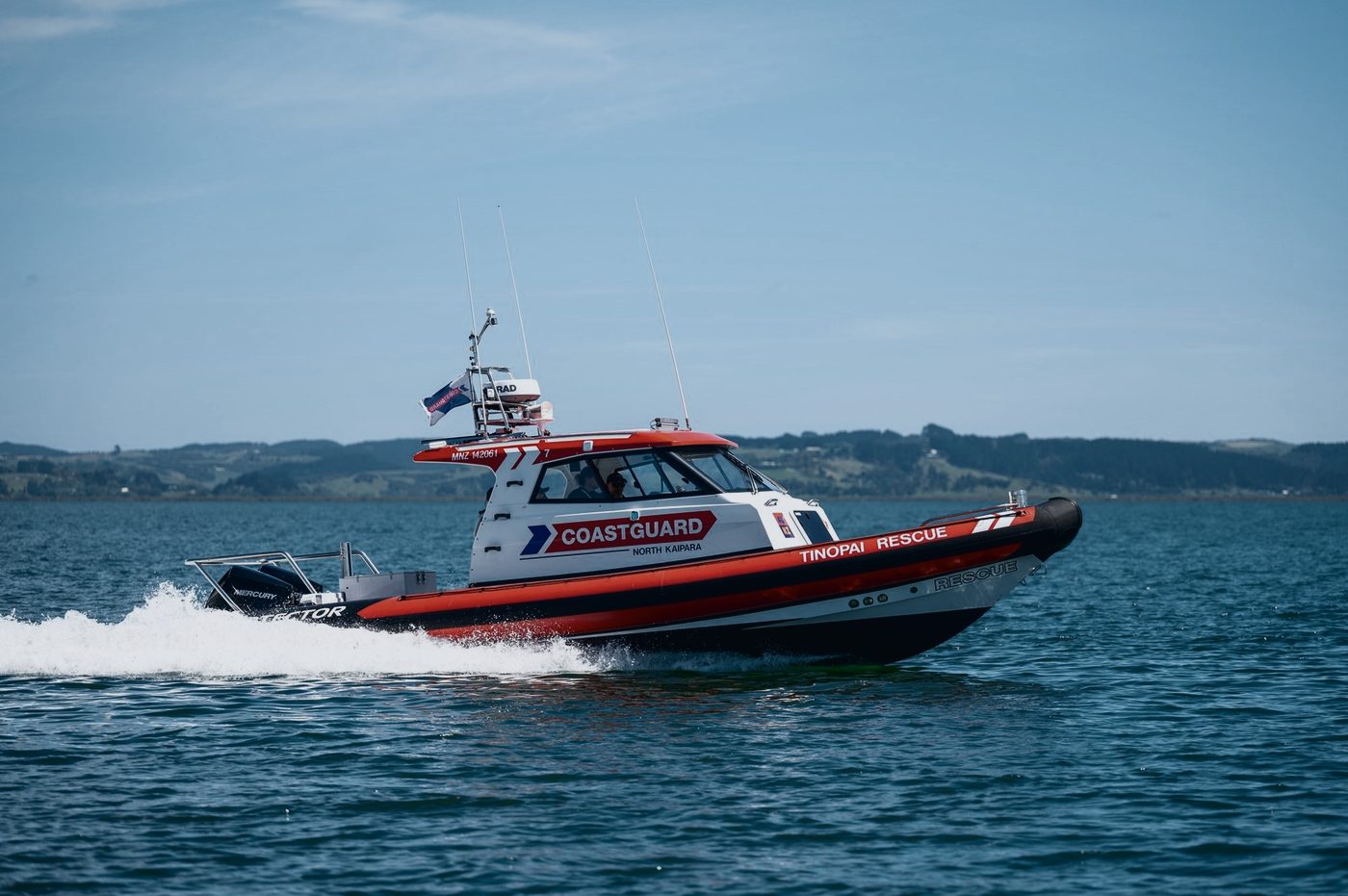 Protector RIB in Coastguard livery running at speed