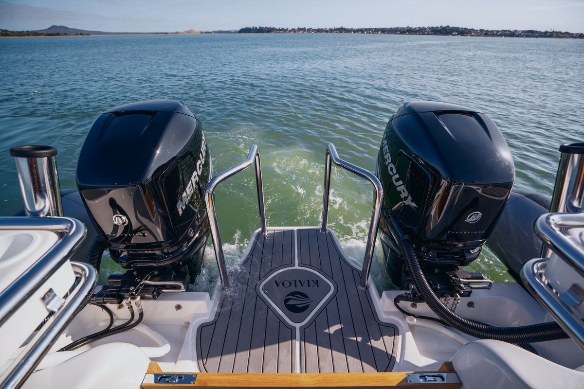 Protector 410 Targa: Walk-through swim platform on twin-outboard builds